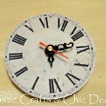 Reassembled clock face with all three hands in place.