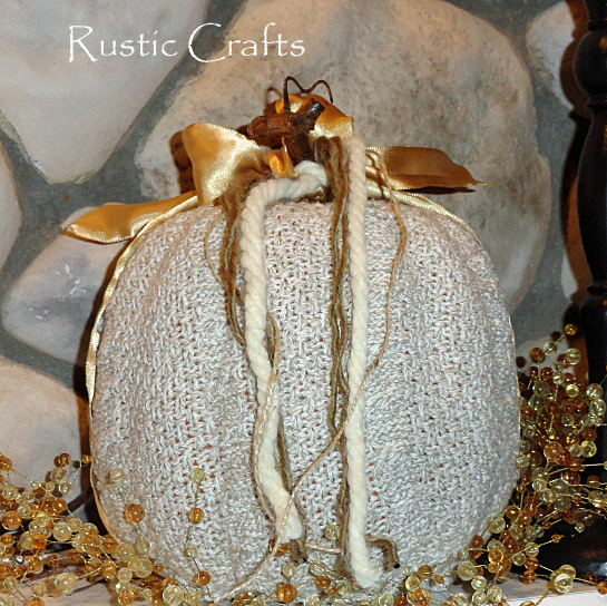 decorating pumpkins with a sweater