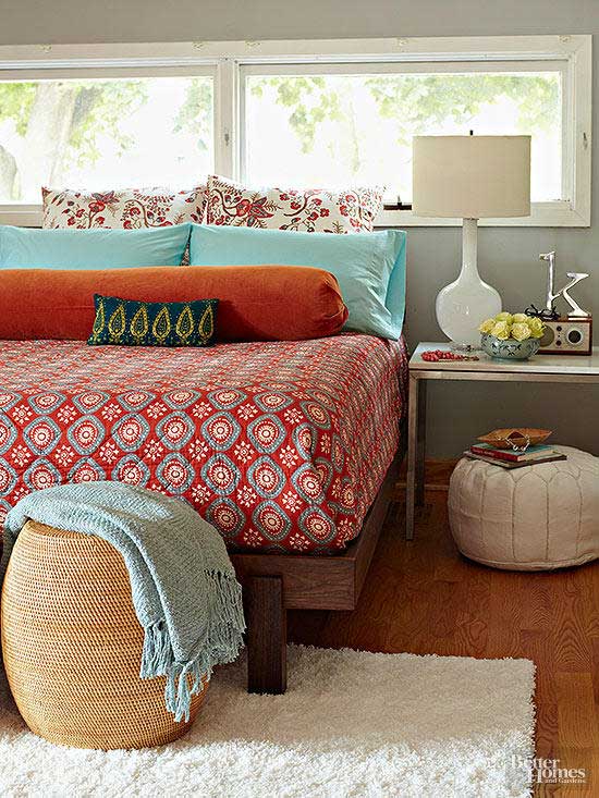 how to add color to a room - orange and blue bedding