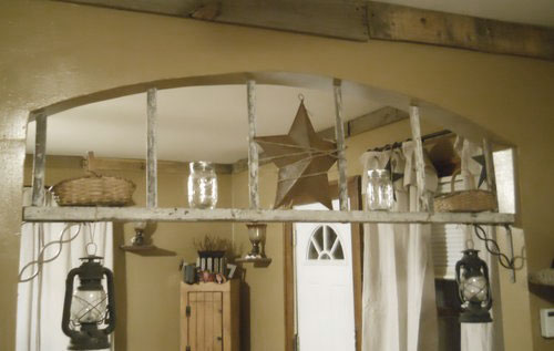 decorating with ladders - ladder archway beam
