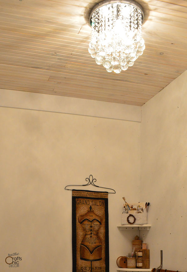 rustic chic decor DIY - hang a glitzy chandelier