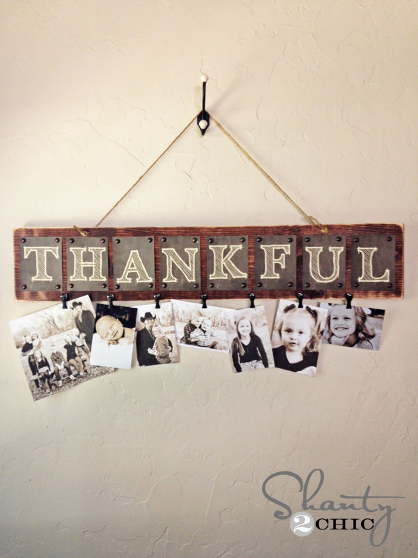 Photo display board with the word Thankful