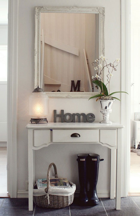 mirror and table in hallway