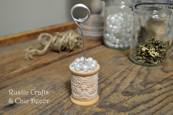 wedding crafts - thread spool table number holders