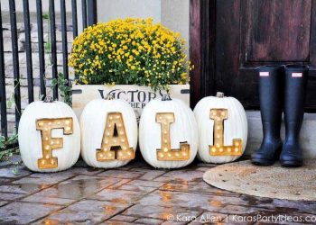 carved letter pumpkins inserted with letter marquee lights