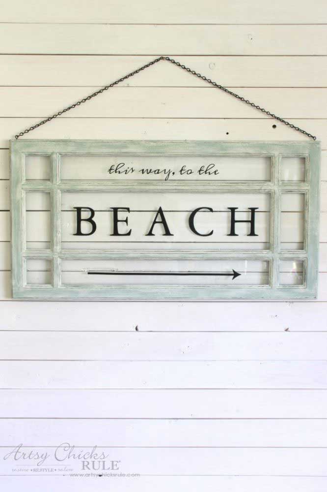 old window beach sign