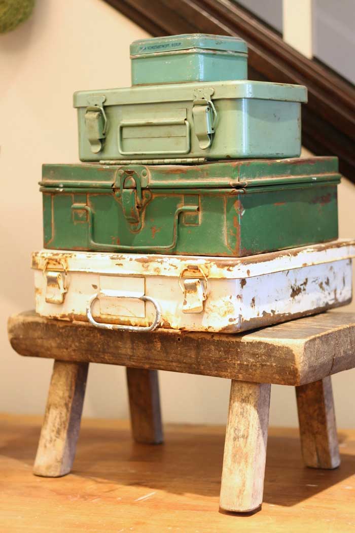 stacked vintage tool boxes