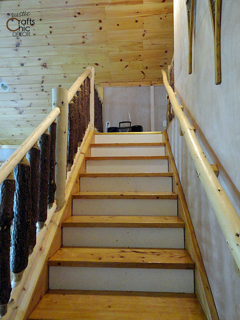 rustic stair rail made from logs