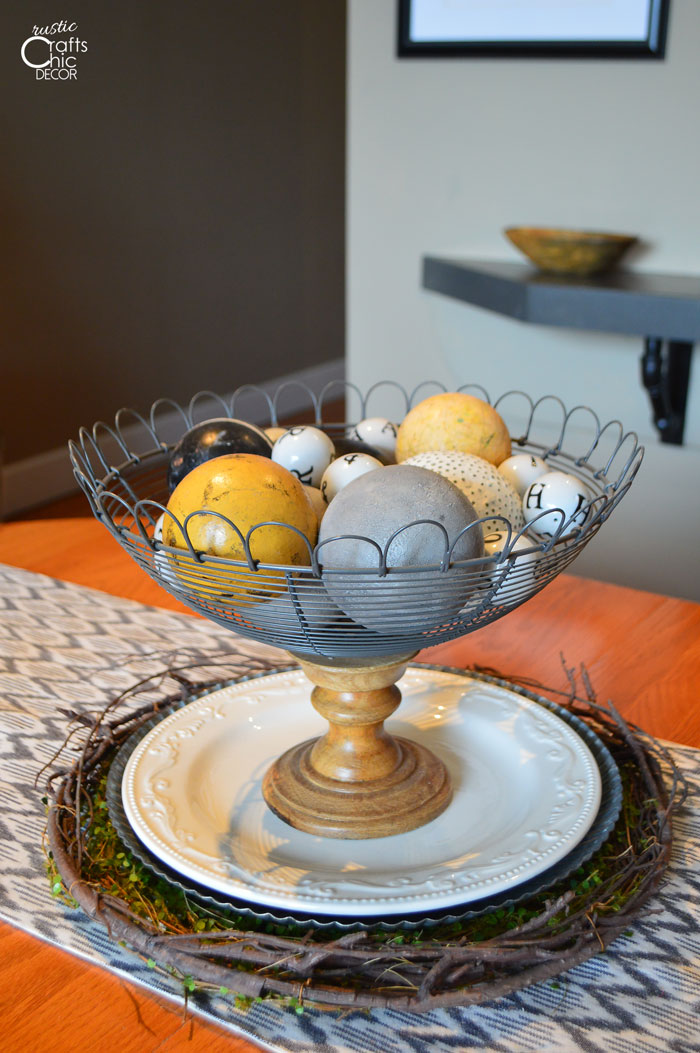 vintage eclectic centerpiece with croquet and other balls