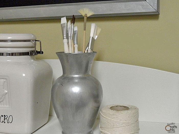 glass vase used for craft storage