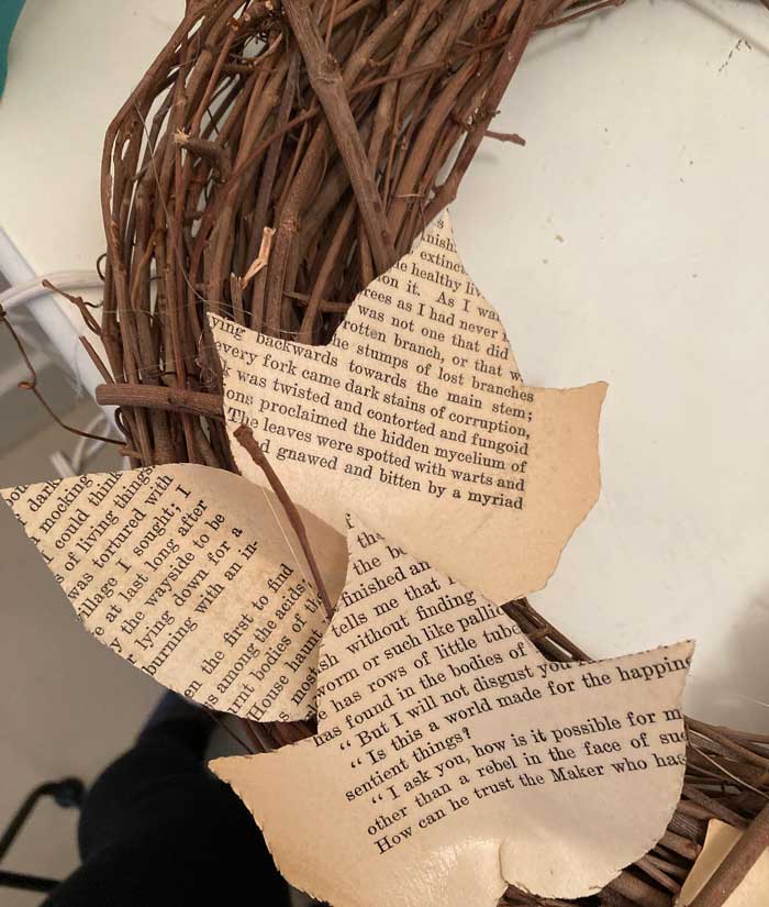 book page leaves glued to grapevine wreath