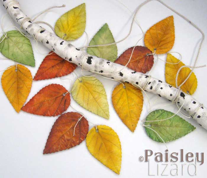 clay birch branch and fall leaves