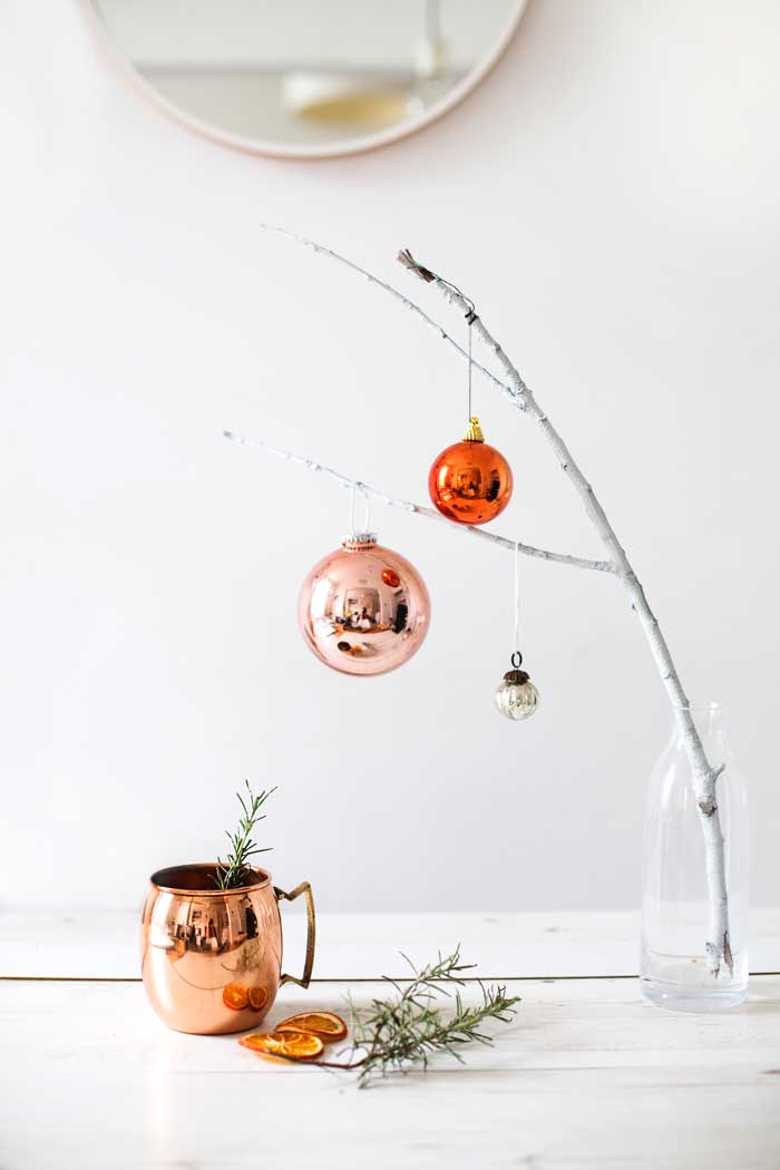 Christmas ornaments on branches