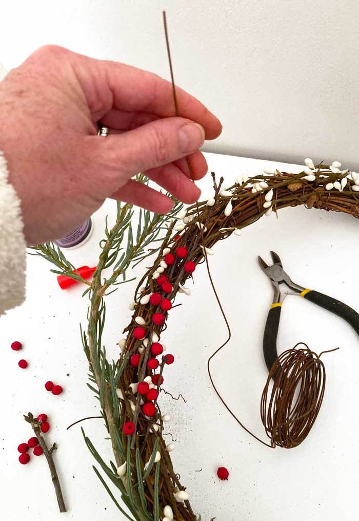 evergreen clippings on wreath