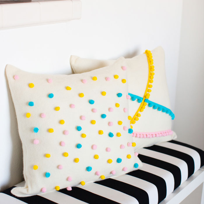 https://rustic-crafts.com/wp-content/uploads/2021/03/pom-pom-polka-dot-pillow.jpg