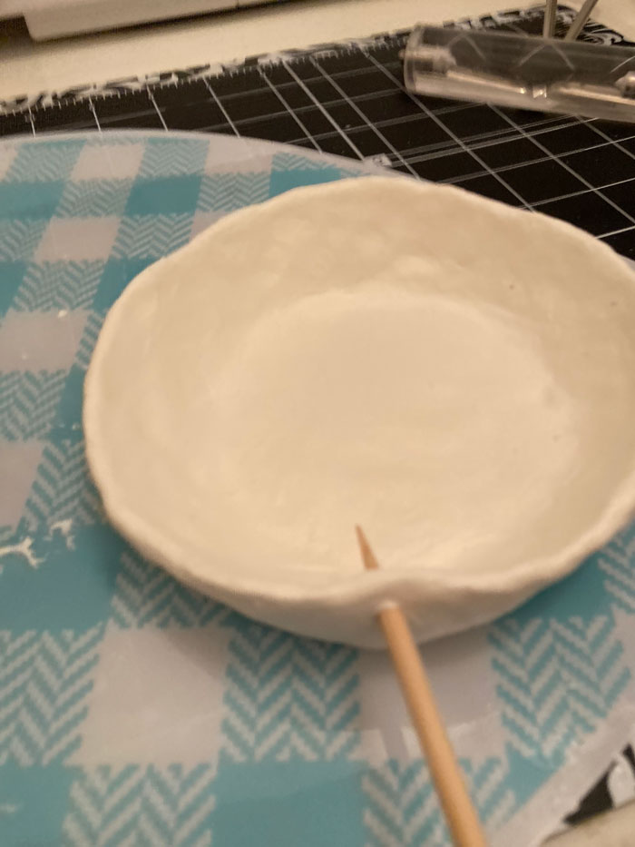 holes made in clay bowl