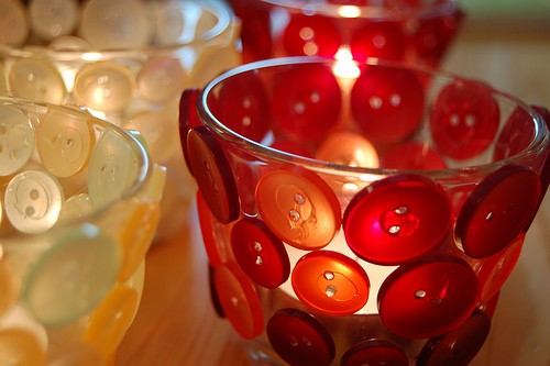 candle holders decorated with buttons