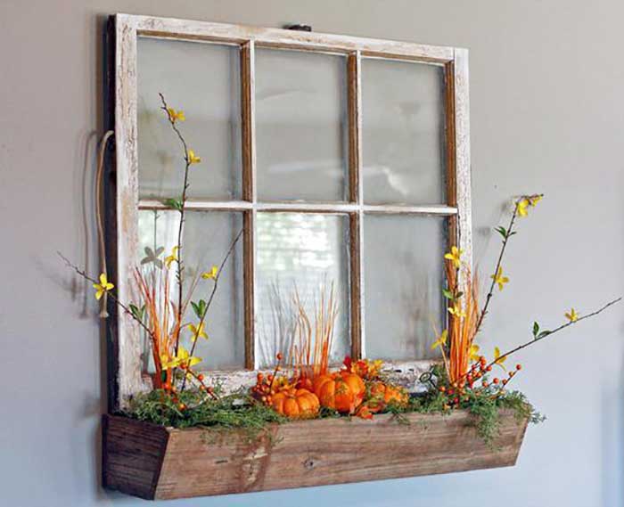 old window with fall flower box