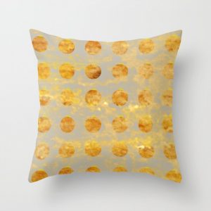 silver and gold ornament pillow