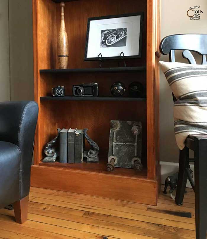 bookshelf styling with vintage cameras