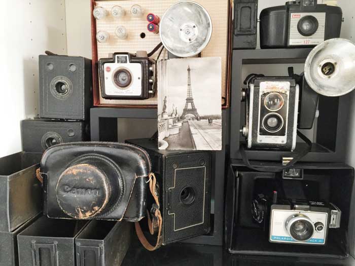 stacked vintage cameras