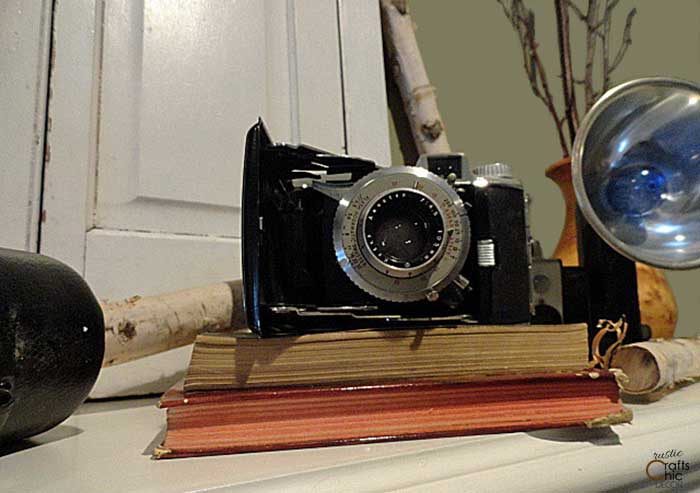 vintage camera on mantel