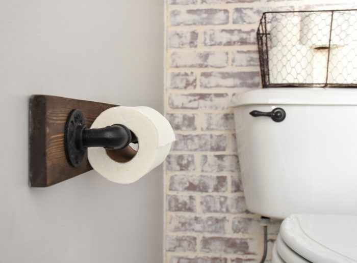 plumbers pipe toilet paper holder
